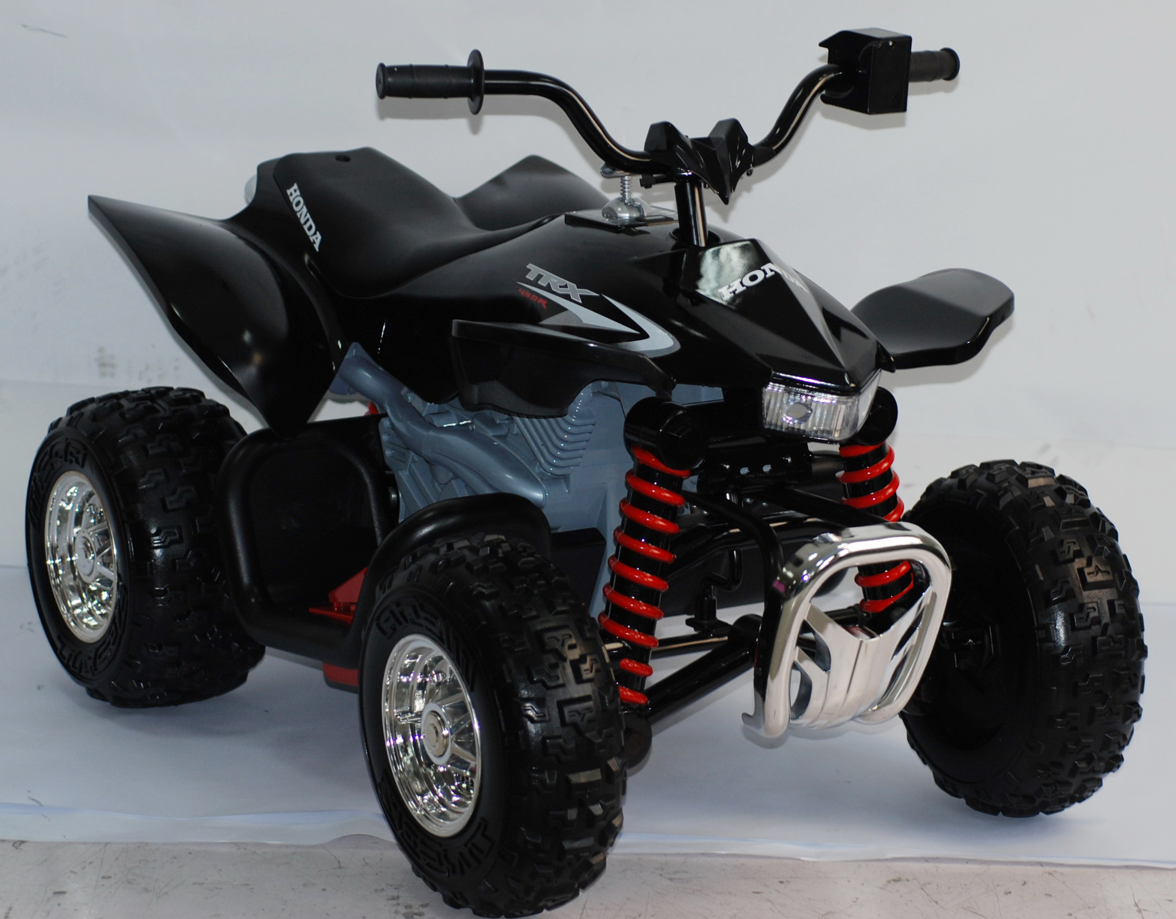 12 Volt Honda TRX in Black and Red - Own the neighborhood with this exciting new ATV!
