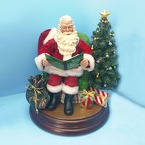 10" Vibrantly Colored Fabriché Christmas Santa Claus Tabletop Figure - 30852019